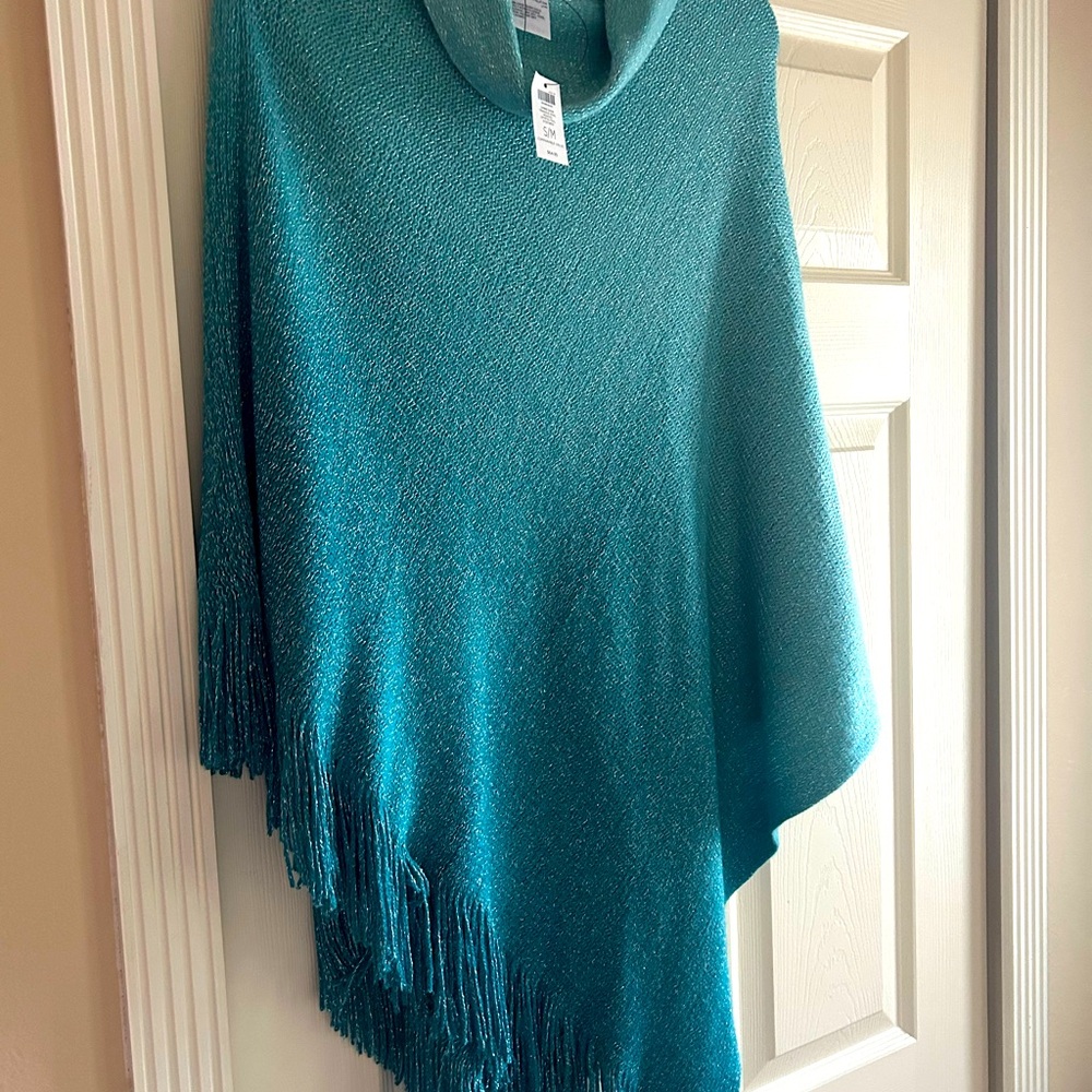 New with tags..Aqua poncho with silver specks ....really pretty! Size is S/M